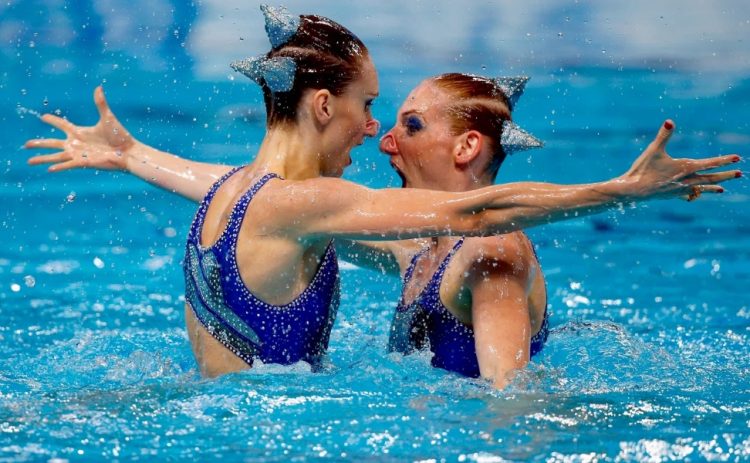 Sync & Giggle: Hilarious Snapshots of Synchronized Swimming