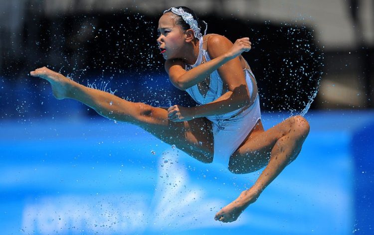 Sync & Giggle: Hilarious Snapshots of Synchronized Swimming