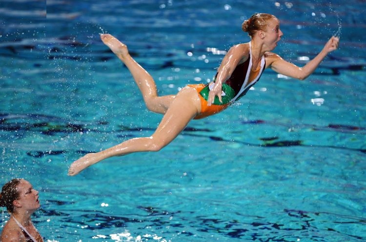 Sync & Giggle: Hilarious Snapshots of Synchronized Swimming