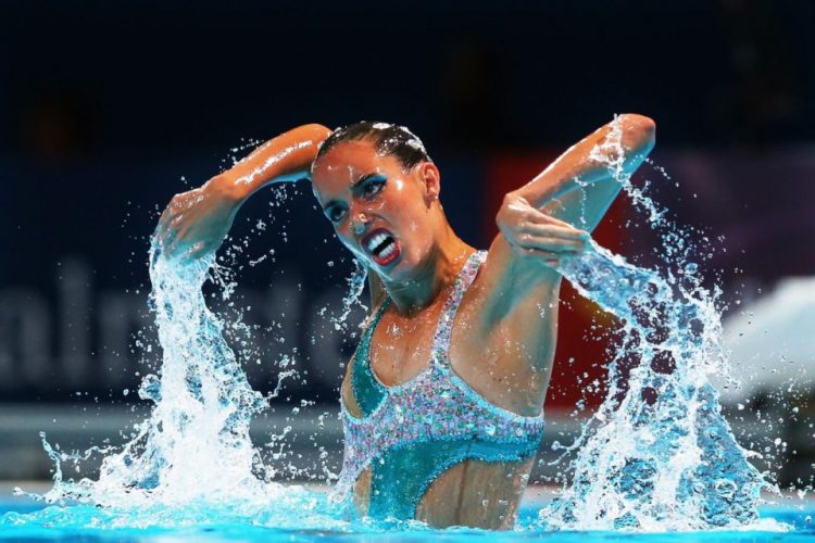 Sync & Giggle: Hilarious Snapshots of Synchronized Swimming