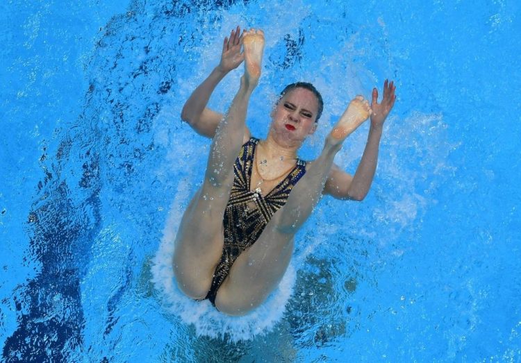 Sync & Giggle: Hilarious Snapshots of Synchronized Swimming