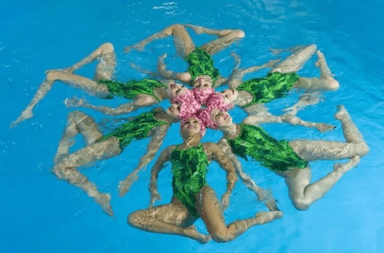 Sync & Giggle: Hilarious Snapshots of Synchronized Swimming