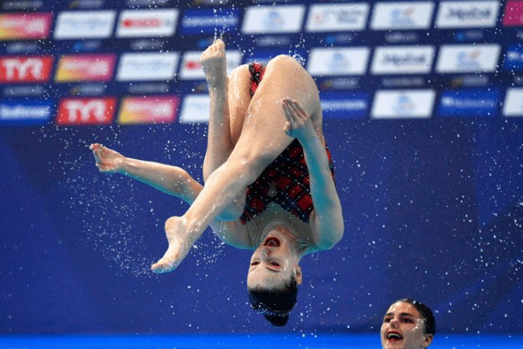 Sync & Giggle: Hilarious Snapshots of Synchronized Swimming